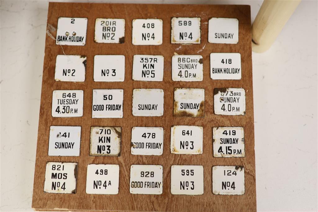 Postal History: A collection of 100 next post enamelled tabs, pre-war, mounted on four wooden display boards